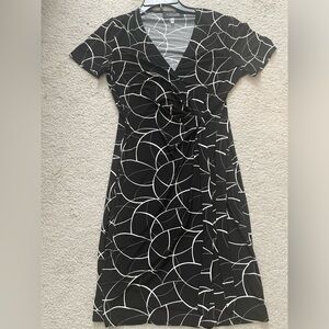 Black wrap dress with white swivel design. Size 6